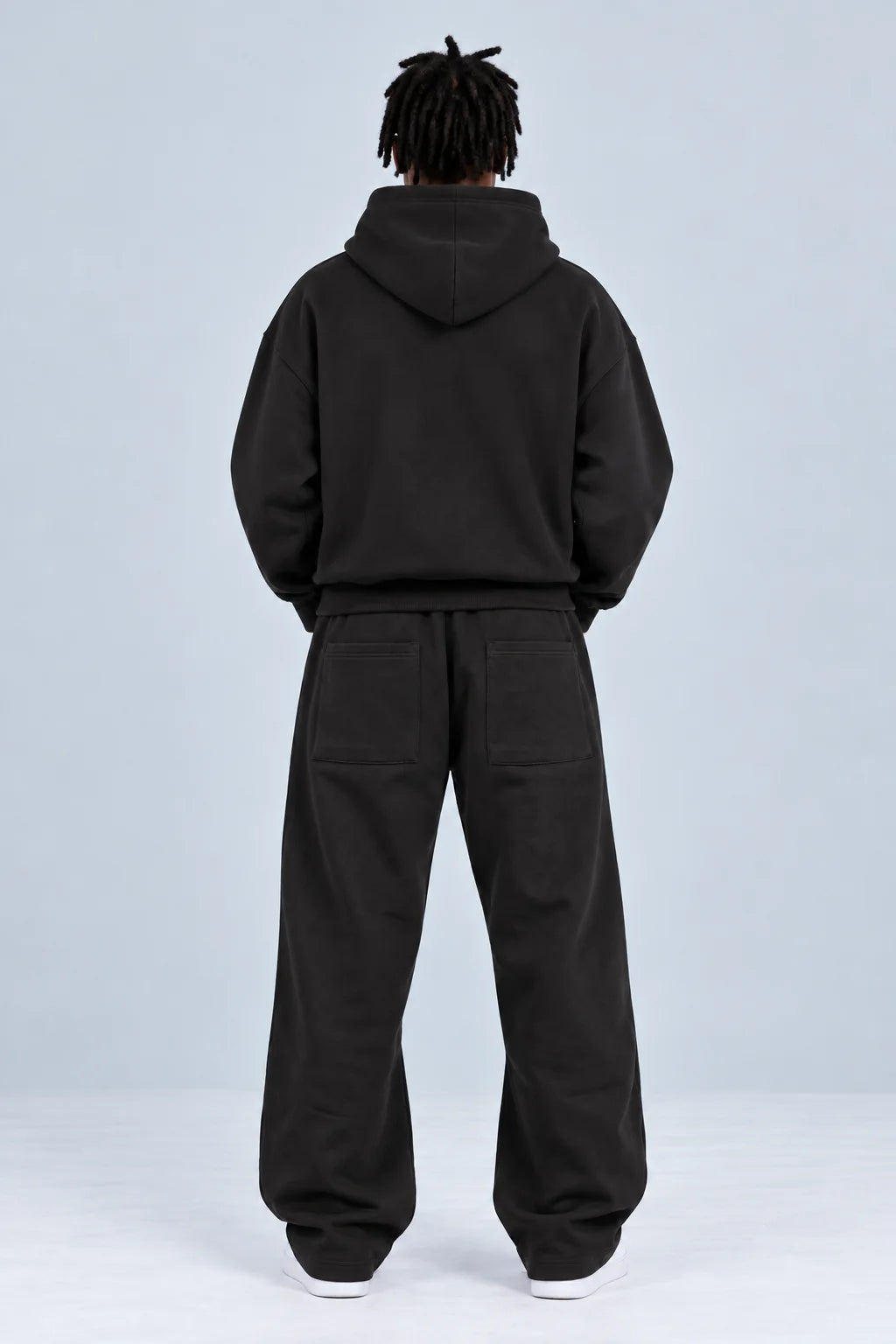 Black hoodie and jogger sweatpants set, shown from back