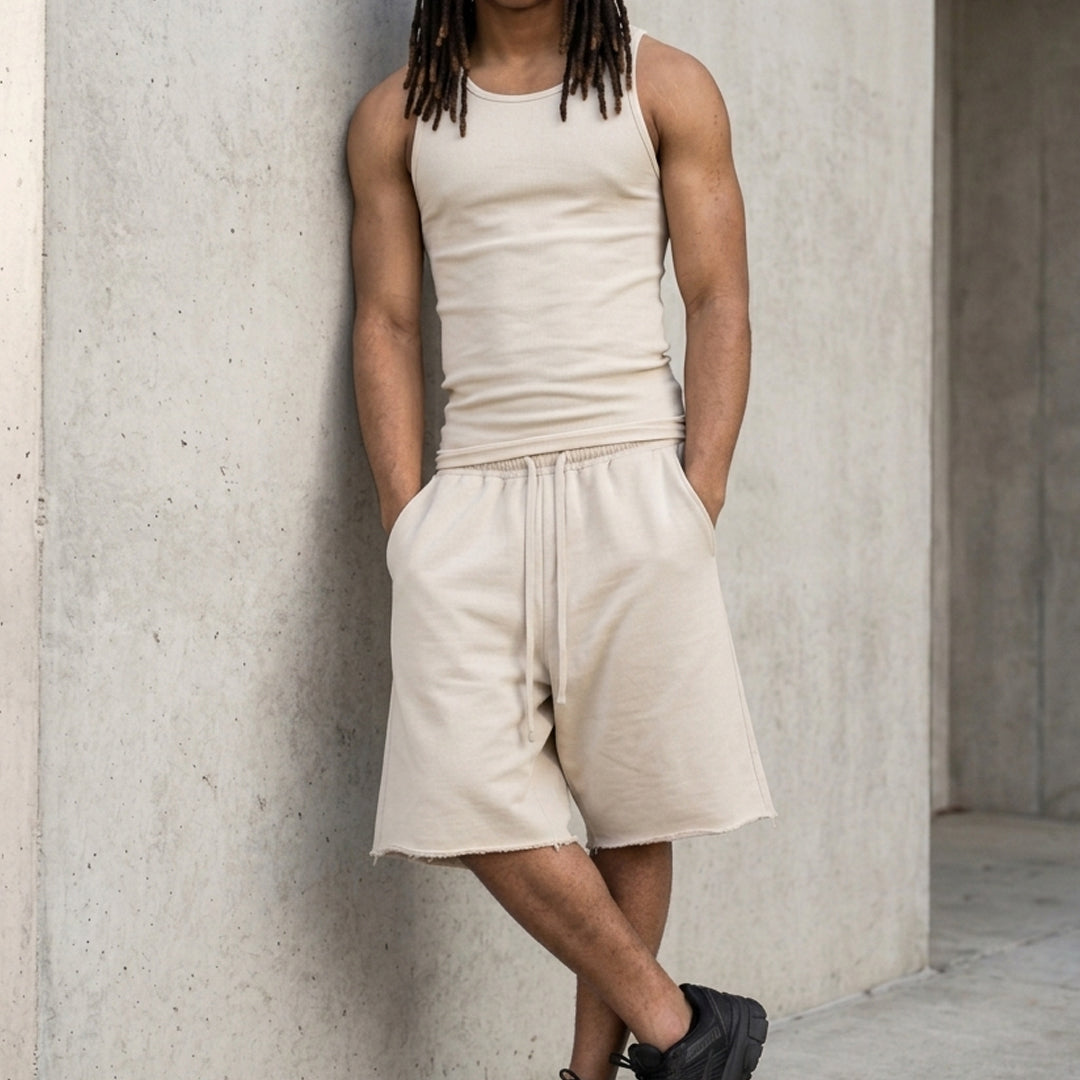 Cloud Dancer baggy shorts raw hem detail, heavyweight cotton fleece, unfinished edge from Loopback Apparel